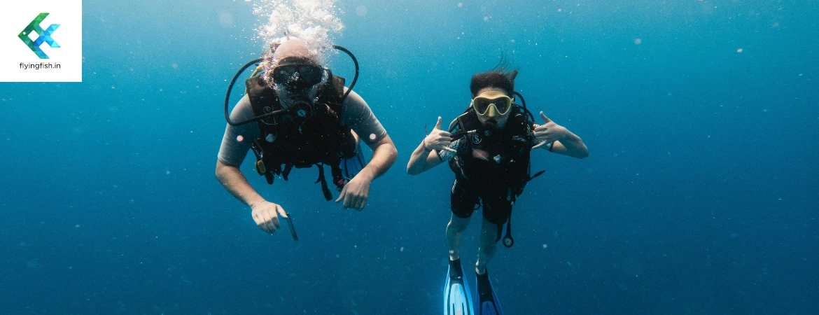 Two scuba divers exploring underwater at Grande Island Goa with FlyingFish Scuba School